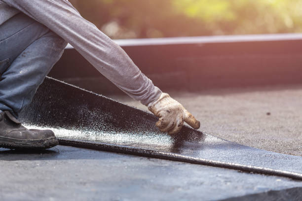 Professional Waterproofing technician working in Long Branch, VA